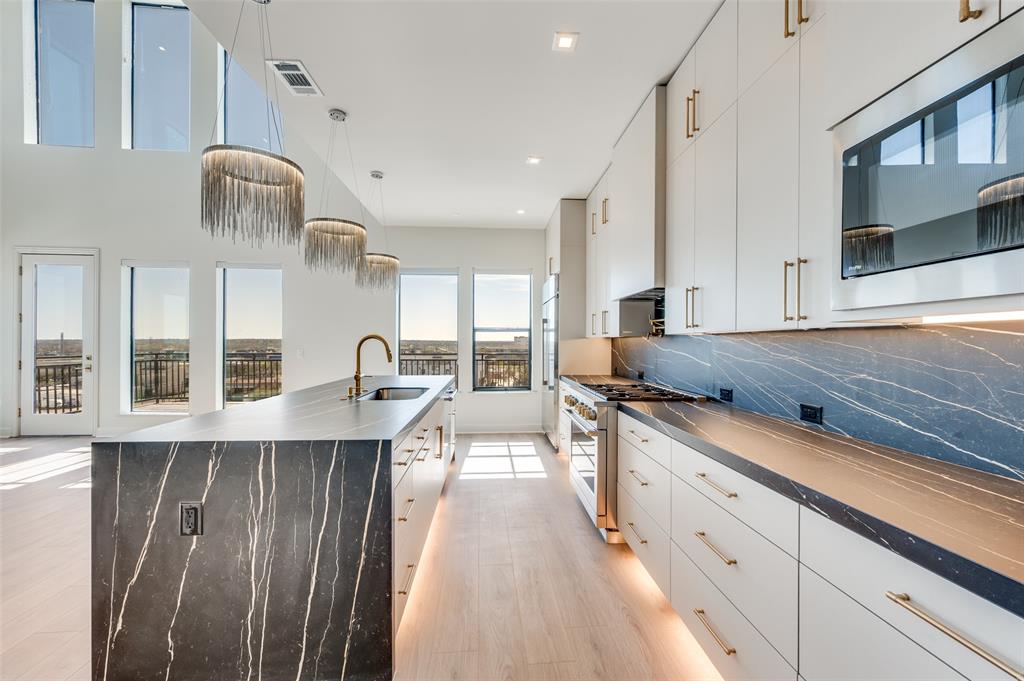 Welcome to Residence 602 at The Ruston—an exceptional opportunity to own a luxury penthouse condominium in this newly constructed, design-forward community on the edge of Downtown Dallas. Thoughtfully designed with refined finishes and a highly functional layout, this residence offers an elevated living experience in one of the city’s most exciting areas.

This spacious, two-story penthouse features an open-concept floorplan ideal for both everyday living and entertaining. Expansive windows bring in abundant natural light, highlighting the clean lines, modern materials, and sophisticated design throughout. The chef’s kitchen is equipped with premium appliances, including a side-by-side Monogram refrigerator, 6-burner Monogram gas range with a pot filler, a walk-in pantry, and a bar area with a wet bar and wine cooler.  The generous island seamlessly connects the living and dining areas.

The primary suite offers a serene retreat with a spa-inspired bath and ample closet space, while the secondary bedroom provides flexibility for guests or a home office. Every detail has been carefully curated to balance comfort and contemporary elegance.

Residents of The Ruston enjoy access to an impressive collection of resort-style amenities, including a reflection pool, state-of-the-art fitness center, media room, wine room, game room, clubhouse, conference room, dog run with wash station, pickleball court, putting green, and outdoor lounge and grilling areas—creating a lifestyle that is both luxurious and effortless.

Ideally positioned near Downtown, this residence offers convenient access to dining, entertainment, and business districts while maintaining a sense of privacy and exclusivity.

Experience modern condominium living at its finest at The Ruston.

Multiple floorplans available. Ask about Buyer Incentives and the opportunity for below-market interest rates with the Preferred Lender.