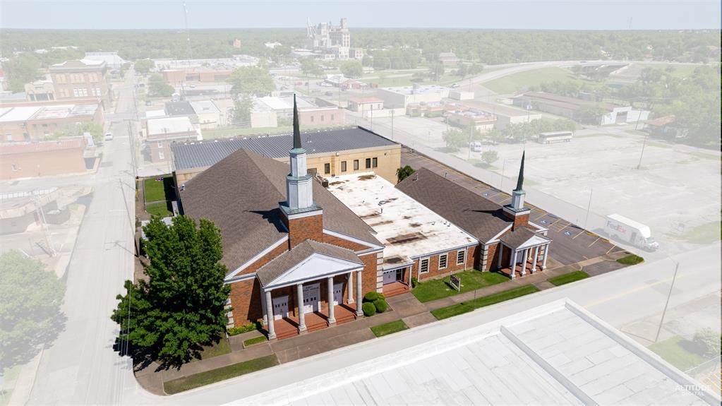 2703 Wesley Street is approximately 35,000 square-feet with 2 stories. There are 2 chapels with their main worship center seating around 575 people. This church features many office spaces, classrooms, a baptistry, pews, worship center balcony, library, laundry room, kid’s center, outdoor playground and more. The history of this property dates back to the 1800’s. In the center of Downtown Greenville, it is the perfect location for a religious center and office space. The site includes a 2.14 acre parking lot adjacent to the site.