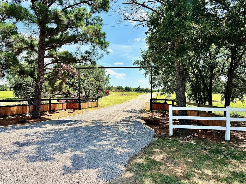 Beautiful piece of property waiting for its new owner to take this setting and make their home. 300' of road frontage on 922. Property has underground power put in and ample power for multiple buildings. There are 6 frost free hydrants, at front and rear of property. Back half of property is divided by pipe and no climb 5' horse wire with 8 quarter acre lots, and large pasture. Water lines run to the back of property with frost free hydrants. Good solid. driveway from front to back of property. Trees and grass land, a parcel waiting to be home. RV or home hookup in front of property and towards the rear. The hard work already done here!!! 
Property can be purchased as a 9 acre parcel or entire 18 acres with barndo. Owner is Agent.