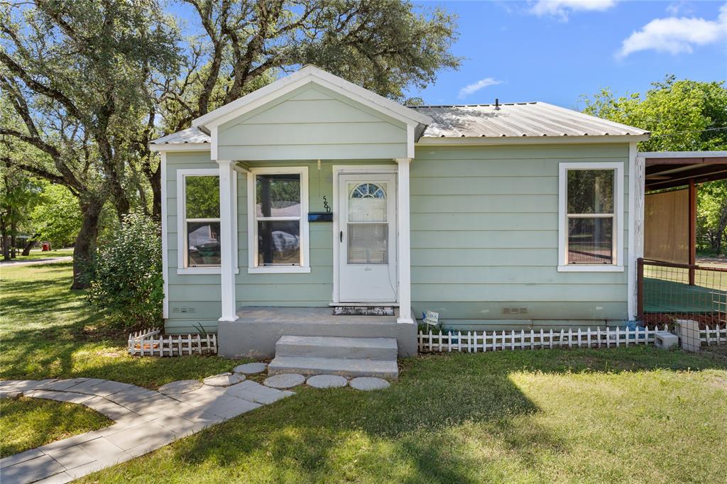Charming 2 bedroom, 1 bath home near Lake Whitney just a short walk to the water!  This cozy property is perfect for a weekend getaway, vacation rental, or full-time living.  Enjoy the peaceful lake lifestyle with easy access to fishing, boating, and outdoor recreation.  This home offers comfortable living space and great location for anyone wanting to be close to the lake while still enjoying a quiet setting.  Don't miss your chance to own an affordable place near beautiful Lake Whitney!