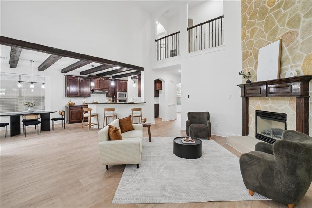 Located in a gated community just minutes from the Entertainment District, this beautifully remodeled home offers the perfect blend of modern updates and timeless character. Conveniently situated near AT&T Stadium and Texas Live!, this spacious residence features over 3,300 square feet of living space with 4 bedrooms, 2 full bathrooms, and a powder room. Designed with both comfort and functionality in mind, the home includes a game room, media room, formal dining area, and a private office. The primary suite is conveniently located downstairs. Step outside to enjoy the spacious backyard complete with a charming pergola, perfect for entertaining or relaxing.