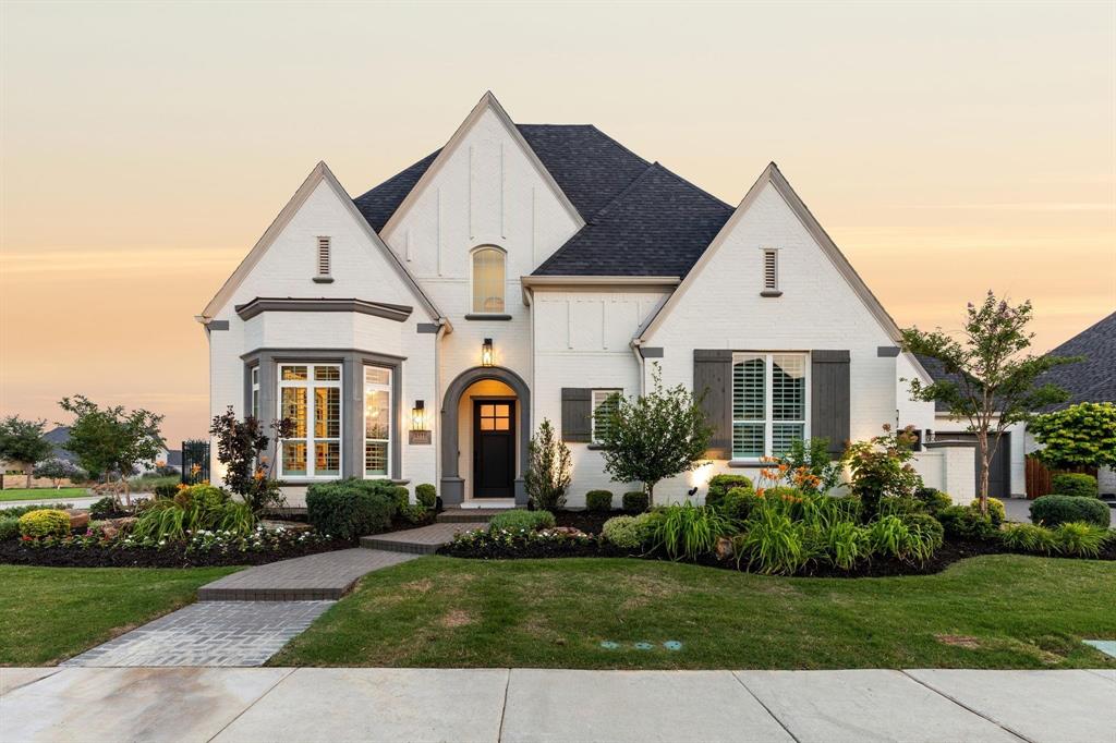 Welcome to a masterpiece of elegance and comfort, perfectly positioned on an oversized corner lot within the highly sought-after Windsong Ranch community. This remarkable home not only boasts a rare 4-car garage but also offers a thoughtfully designed floorplan that caters to every need. Step inside to discover an expansive layout featuring a first-floor media room, a private study, and a dedicated kids' workstation, making it ideal for work, play, and relaxation. Beautiful hardwood floors, automatic Hunter Douglas shades, custom curtains, and designer lighting by IBB add a touch of sophistication throughout. Dual staircases enhance convenience and flow. The main level also includes a secluded guest suite, ensuring privacy and comfort for visitors, while the lavish primary retreat invites you to unwind in a spa-like bath with a spacious walk-in closet. The chef’s kitchen is a culinary dream, equipped with premium Wolf appliances, seamlessly connecting to the grand living room with vaulted beamed ceilings and a stunning stone fireplace. Upstairs, three en-suite guest bedrooms, a card room, and a game room provide ample space for gatherings and leisure. Step outside to your private oasis—an expansive backyard designed for ultimate entertainment and relaxation. Enjoy the covered patio with automated shades, a separate spa, an inviting firepit, a sparkling pool, and a sunken patio complete with an outdoor kitchen. This exceptional outdoor space is perfect for hosting or simply enjoying serene evenings under the stars. Adding even more appeal, a brand new high school is coming soon to the area, enhancing the community's value and providing a top-tier educational opportunity just moments away.