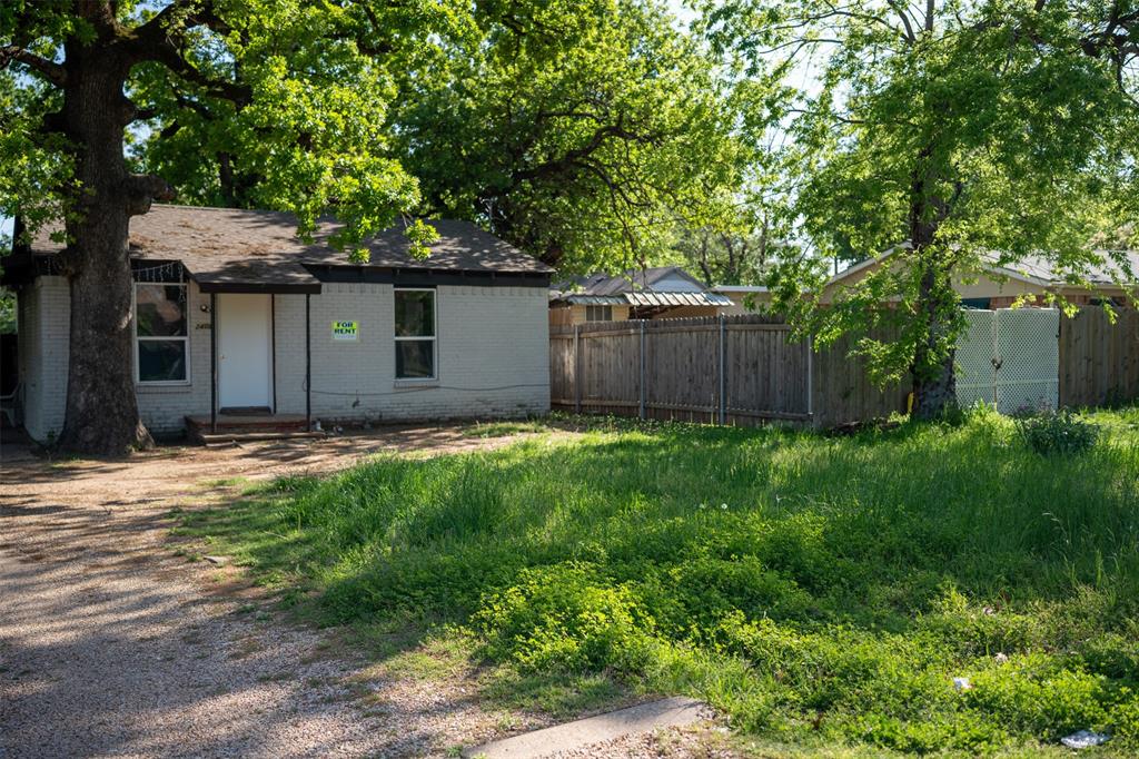 Two houses sit on one lot.  Ideal for income producing or live in one and rent the other.  There might be some investment opportunities for a zoning change and create a greater value with a higher zoning use.  Current rentals are $1700 per month and $1600 per month