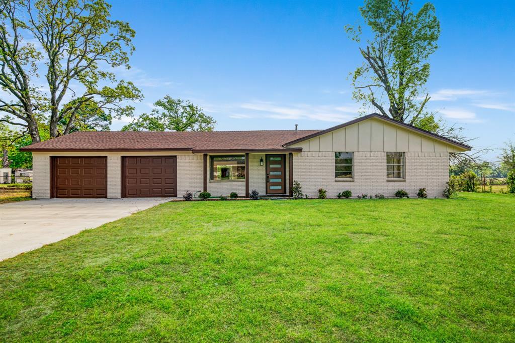 Welcome to this beautifully remodeled 3-bedroom, 2-bathroom home that perfectly blends modern updates with spacious, comfortable living. Each bedroom offers generous space, creating the perfect retreat for family or guests, while both bathrooms have been thoughtfully redesigned with stylish finishes. The heart of the home is the stunning kitchen, featuring a large island, light-colored cabinetry, and eye-catching decorative lighting that adds warmth and charm. Just off the kitchen, you’ll find an expansive dining area—ideal for gatherings, entertaining, or everyday living. The oversized living room provides plenty of room to relax and unwind, complete with a cozy wood-burning fireplace that adds character and comfort. Situated on nearly half an acre, this property offers beautiful views overlooking a wide, open country field—giving you that peaceful, private feel while still being close to town.
This move-in ready home has all the space, style, and setting you’ve been looking for—don’t miss it!