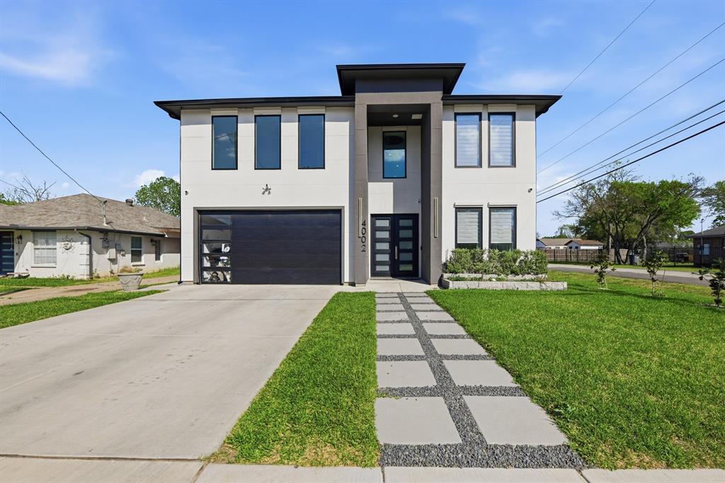 **SELLER IS OFFERING A $7,000.00 SELLER CONCESSION TO THE BUYERS WITH ACCEPTABLE OFFER CAN BE APPLIED TOWARDS A RATE BUY DOWN OR TO COVER CLOSING COST*** Welcome to this Modern Luxury Home. This Luxury home provides an abundance of amenities such as shopping, dining, entertainment options within Dallas. Design District, Bishop Arts, Stevens Park Golf Course, Trinity Groves. This Luxury home boast 4,116 sqft, 6 Bed, 5 full bath, 1 half bath. Living room features a reimagined open floor concept with 20 ft ceilings and luxury 12 ft LED Crystal Chandelier, Tile and Engineered wood floors spread throughout the entire home! Custom Modern staircase, The kitchen features a quartz waterfall island, all Kitchen Aid appliances, Commercial grade vent, under cabinet lighting, custom wood no slam cabinets in every corner of the kitchen! The living room includes custom built-in wood cabinets, 20 ft ceilings, with plenty of natural light! Primary room downstairs primary bathroom dream come true which includes a double sink vanity for his and her alongside built-in makeup vanity! With a stand-alone tub, glassed enclosed walk-in shower. Huge walk in closet walk in closet with built in shelves, The home is equipped with built in speaker system, custom lighting fixtures throughout, Custom tile work throughout, Office, Game room, Formal Dining room, 2nd Prep Kitchen, 3 car Garage, Built in surveillance system, Sprinkler system, Tank less water heater, Oversized backyard with 8ft privacy fence. Come see this masterpiece for yourself!