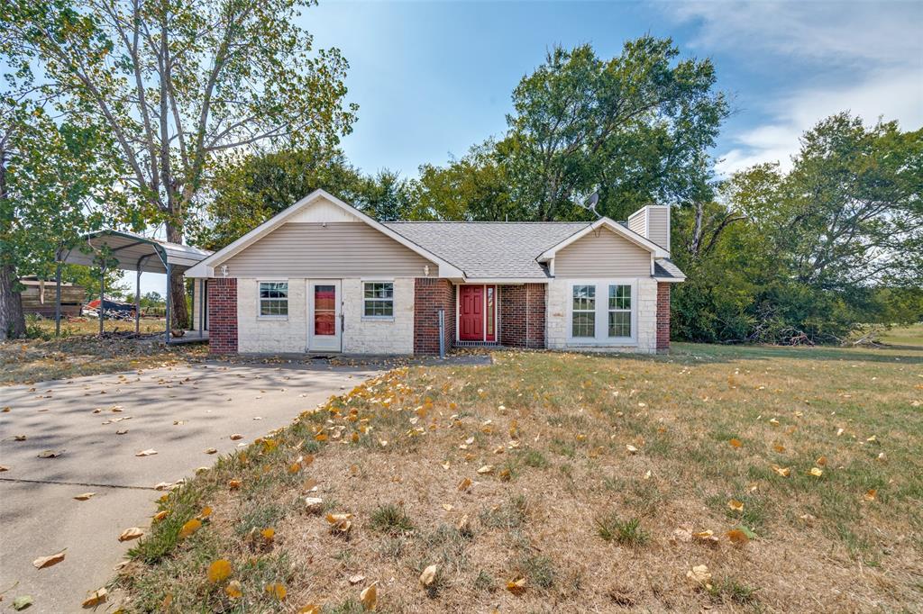 Enjoy the charm of country living with the perks of a lakeside community in this 3-bedroom, 2.5-bath home. Offering plenty of space and thoughtful updates, this property is perfect for both everyday living and weekend entertaining.

Inside, the garage has been converted into a versatile extra room—ideal as a 4th bedroom, media room, or cozy den for family gatherings. The open layout flows easily through the main living areas, with a comfortable kitchen and dining space that connects seamlessly to the outdoors.

Step outside to a spacious back deck, perfect for summer cook-outs, morning cofee or quiet evenings overlooking the yard with mature trees. The property also includes a metal one-car garage with roll up door, a carport, and a backyard shed—providing plenty of storage and parking options.
With its laid-back setting and easy access to the lake and highways, this home is the perfect spot to slow down, spread out, and enjoy the good life.



All the benefits of lakeside community living with the flexibility that this home offers. Whether you need more space for family, work, or play, this property delivers.