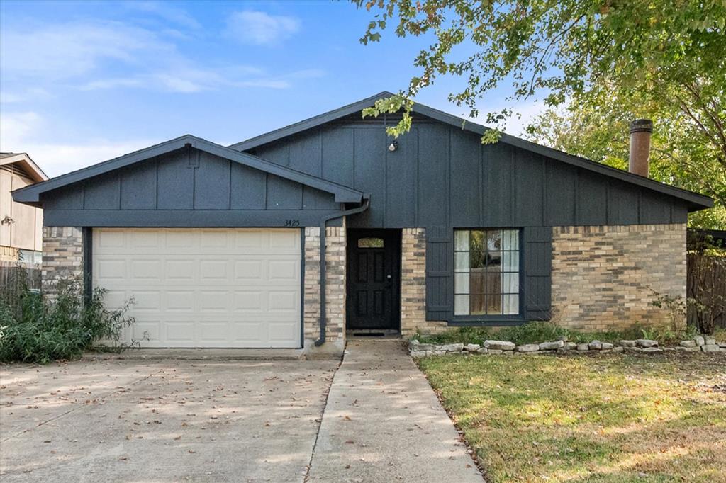 Welcome to this inviting 3 bedroom, 2 bath home in the quaint Mayfield Meadows neighborhood within Arlington ISD. Nestled on a .16-acre lot with mature trees, this charming home offers comfort and thoughtful updates throughout. A cozy fireplace anchors the living area, creating a warm and welcoming place to gather. The kitchen was refreshed in 2024 with granite counters, stylish tile backsplash, newer appliances, updated hardware, and modern ceiling fans. Both bathrooms have been beautifully updated as well. The primary bedroom features an ensuite bath and dual closets for added storage and convenience. Laminate and tile floors flow throughout the home—no carpet! Enjoy outdoor relaxation on the covered side patio overlooking the fenced backyard. Located near The Parks Mall area, you’ll love the easy access to shopping, dining, entertainment, and major highways. A  wonderful place to call home!
