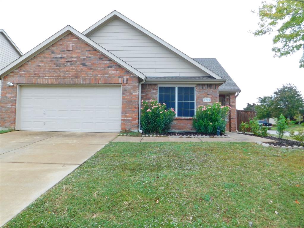 LAWN CARE INCLUDED!  Three bedroom, two bath home on a corner lot in south Denton. Wood-look flooring throughout all living areas and bedrooms for easy clean up. The home also features vaulted ceilings, walk in master closet and upgraded light fixtures and fans. Good sized fenced back yard and neatly landscaped front gardens. Refrigerator and washer & dryer included.