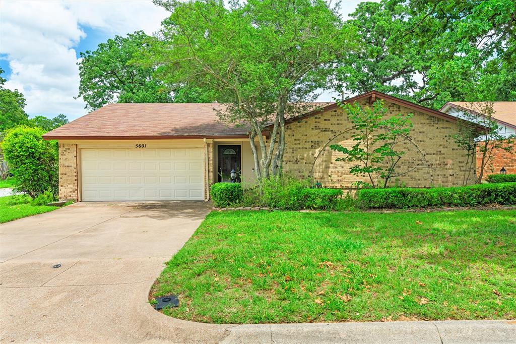 Just in time for summer! Move in before school starts! Lovely 3 bedroom home on corner lot with mature trees! Open floor plan. Slate floors in kitchen & living area. All bedrooms have walk-in closets. Master has 2 walk-in closets. Vaulted ceilings. Pretty brick fireplace. Large kitchen with breakfast bar,  smooth cook top & plenty of cabinet & counter space. Pass through from kitchen to Covered patio is nice for entertaining. Large fenced backyard. Convenient location with easy access to shopping, sought after schools & I-20.