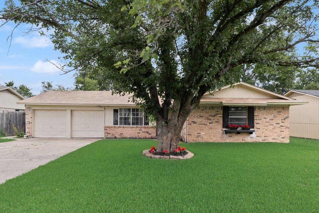 Whether you're a first-time buyer, looking to downsize, or simply searching for a place to call home, this 3-bedroom, 2-bath brick home is worth a look. Offering approximately 1,598 square feet, the property features a spacious living area, several updates, a covered back patio, and a fenced backyard with room to relax, entertain, or play. The 1.5-car garage provides added convenience and storage. Move-in ready and full of possibilities, this home is waiting for its next chapter.  Come see why this could be the place you'll love coming home to every day.