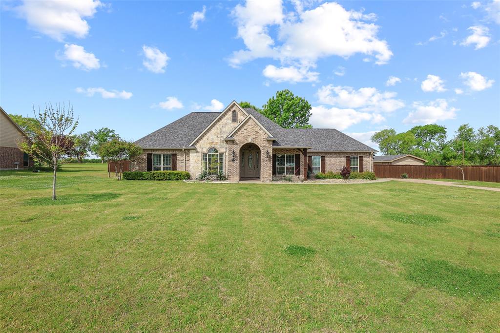 Custom Home on 1 Acre in Sherman's Seasons West with Workshop + Oversized Garage!

Craving space, privacy, and a property that truly stands out? This custom 3 bed, 2 bath home on just over an acre in Sherman’s sought-after Seasons West delivers—plus a workshop with electricity and oversized garage that’s hard to find.

Step inside to an inviting open-concept layout with hardwood floors, crown molding, and a spacious living area anchored by a fireplace and custom built-ins. The kitchen is both functional and beautiful, featuring granite countertops, abundant cabinetry, plus glass-front cabinets with lighting and adjustable shelves for added style and storage.

The oversized primary suite offers a true retreat with a triple-tiered custom closet system, along with an ensuite bath featuring dual vanities, soaking tub, and separate shower. Secondary bedrooms provide flexibility for guests, office, or hobbies, and the guest bathroom features a Re-Bath walk-in bathtub (2023)—a great accessibility upgrade.

Outside is where this property shines—an acre with mature landscaping, room to add a pool or outdoor living space, and a 30'x16' workshop with electric perfect for hobbies, woodworking or she-shed. A separate 8'x16' storage shed provides additional space for tools, lawn equipment, and outdoor essentials. Major updates include a roof replaced in 2023.

Located in Seasons West in Sherman, enjoy peaceful, spacious living with convenient access to shopping, dining, and major highways.

Acreage, custom features, accessibility upgrades, and space to grow—this is the one you've been waiting for!