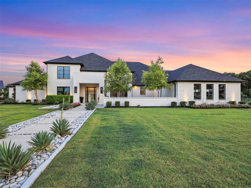 A spectacular Dave Williams custom home with a private indoor half-court basketball gym! Set on 1.53 wooded acres in a serene, gated cul-de-sac of only 17 homes, this estate features open living spaces with a fireplace and modern kitchen with quartz countertops, built-in refrigerator, commercial-grade cooktop, double convection ovens, large island & massive walk-in pantry with coffee bar. The breakfast nook overlooks the pool & greenbelt. The primary suite offers a sitting area, dual vanities, a dual-head walk-in shower, garden tub, dry sauna, additional laundry area & spacious walk-in, custom closet. The east wing has 2 additional bedrooms, one with ensuite bath, while the west wing includes a media room, 2 additional bedrooms, each with ensuite bath & WIC plus a 50' x 41' gym! Outdoors are 2 covered patios, easy-entry pool with slide, diving board & heated spa, and a large fenced backyard. Located in the booming community of Celina & renowned Celina ISD, your opportunity awaits!