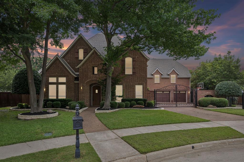 Nestled on a quiet cul-de-sac in the highly sought-after golf course community of Bridlewood, this beautifully designed home blends timeless elegance with the comfort and functionality families are truly looking for. Offering 5 bedrooms, 4.5 bathrooms, a 3-car garage, and thoughtfully curated living spaces throughout, the home is equally suited for everyday living and effortless entertaining. Located within award-winning Flower Mound schools, it’s the kind of home families can settle into and enjoy for years to come.

From the moment you step inside, the home feels warm and inviting with rich hardwood floors, soaring ceilings, and natural light throughout. A private study with custom built-ins provides the perfect work-from-home space, while the chef’s kitchen serves as the heart of the home with a large island, gas cooktop, double ovens, built-in refrigerator, breakfast bar, and butler’s pantry designed for both function and gathering. The spacious family room features vaulted beamed ceilings and a stunning fireplace, creating a welcoming space to relax or entertain.

The downstairs primary suite offers a peaceful retreat with its own sitting area and a spa-inspired bath complete with a jetted tub, separate shower, and beautiful natural light. Upstairs, generously sized secondary bedrooms are paired with an oversized game room that offers endless flexibility for movie nights, entertaining, or play.

Outside, the backyard was designed to be enjoyed year-round. A sparkling pool and spa, outdoor kitchen, covered patio, and expansive grassy areas create the perfect setting for everything from quiet evenings at home to hosting family and friends.