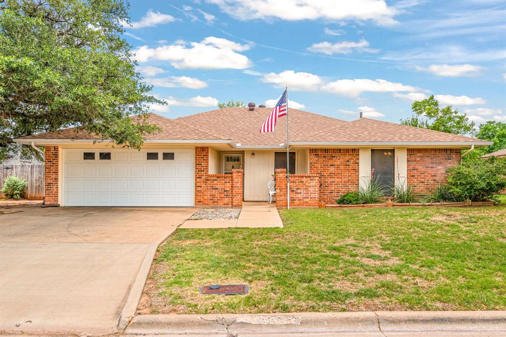Welcome to 7641 John Carroll Drive, nestled in the highly sought after Wylie ISD within the established Mesquite Forest neighborhood! This well maintained 3 bedroom, 2 bath home is move in ready and available for immediate showings. Recent updates include fresh interior paint, a new roof installed in 2023, and gutters, while abundant storage throughout adds everyday convenience. From the moment you arrive, you'll be greeted by attractive landscaping and a charming covered front portico, the perfect place to enjoy your morning coffee or unwind in the evening.
Inside, a welcoming entry opens to a spacious living room featuring a beautiful brick gas fireplace and a semi open floor plan designed for both comfort and functionality. The dining area flows seamlessly into the kitchen, which offers ample cabinet and counter space, generous storage, and views of the spacious backyard. Just off the kitchen, you'll find a large laundry room with space for a second refrigerator or freezer, a mudroom bench, or additional storage, conveniently connecting to the two car garage. The private primary suite features dual sinks, a soaking tub, separate shower, and two oversized walk in closets. Two additional bedrooms are generously sized, with one featuring a large walk in closet and the other offering excellent storage space. These bedrooms share a well appointed bathroom with a tub-shower combination. Step outside to enjoy the spacious backyard, complete with a large covered patio and storage shed, ideal for relaxing, entertaining, or spending time outdoors. The lush lawn and inviting outdoor living spaces enhance the home's charm and curb appeal. The refrigerator, dryer, and storage shed will convey with the sale, offering added value and convenience for the next owner. Don't miss this opportunity to own a beautifully maintained home in one of the area's most desirable school districts!