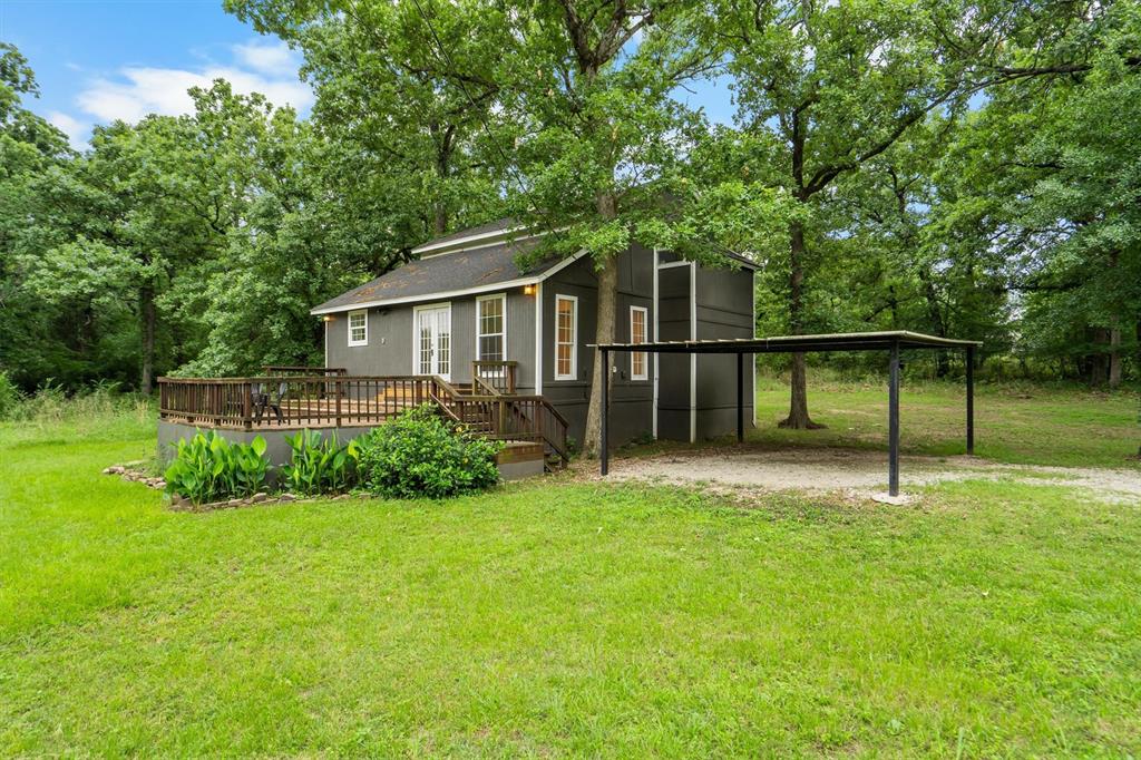 Outstanding opportunity on this lovely, remodeled and refreshed lake house, with plenty of room to park your boat and watercraft. Those who seek for a peaceful home, rather than just a house, will be pleased by the tranquil nature and surroundings of this home. Remodeled and refreshed from top to bottom, this double lot has over a quarter acre of property. Well-lit by the many windows, this split level home has all the room you would need, both inside and out. The large deck is the perfect spot to enjoy coffee and a book, with beautiful views of a finger of the lake across the street. Very close access to the boat ramp. 

Amazingly, this home is available and qualifies for a special zero-down-payment government-backed loan program, with a very reasonable interest rate to help buyers get into a home of their own. This is a limited time special offer, so make of point of seeing it while it's still available.
