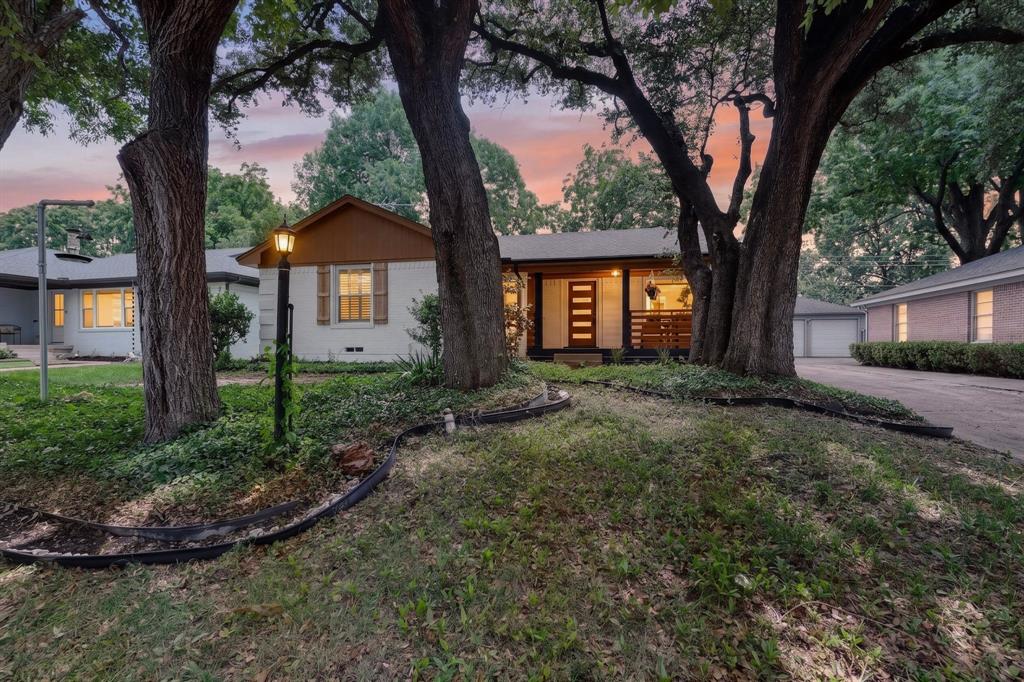 Welcome to this beautifully renovated home nestled in the highly sought-after Lochwood neighborhood, celebrated for its towering mature trees, scenic parks, and welcoming community atmosphere. Ideally situated just minutes from White Rock Lake, the Dallas Arboretum, and the vibrant shopping and dining of Casa Linda Plaza, this home offers the perfect blend of peaceful living and urban convenience.

Thoughtfully redesigned from top to bottom, this move-in-ready residence showcases approximately 1,800 square feet of stylish living space with high-quality updates throughout. The stunning new kitchen serves as the heart of the home, featuring brand-new cabinetry, sleek countertops, modern fixtures, and a complete suite of new stainless steel appliances. An open-concept layout creates an effortless flow between the kitchen, dining, and living areas—ideal for everyday living and entertaining.

Enjoy added peace of mind with an all-new plumbing system, along with numerous modern upgrades that make this home truly turnkey. Large windows fill the interior with natural light while offering picturesque views of the lush greenbelt directly across the street, providing both privacy and a tranquil setting.

Step outside to your own backyard oasis, where a sparkling swimming pool invites you to relax, entertain, and enjoy the Texas summers. The spacious outdoor living area offers endless possibilities for gatherings with family and friends.

Located in one of East Dallas' most established neighborhoods, this exceptional property combines timeless charm with contemporary finishes, all within easy access to downtown Dallas, major highways, premier dining, shopping, recreation, and highly desirable neighborhood amenities.

Don't miss this rare opportunity to own a fully remodeled home in one of Dallas' most cherished communities!