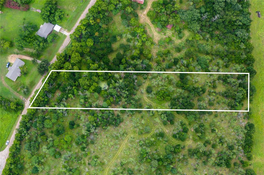 These lots have NO RESTRICTIONS – bring your mobile home, RV, or custom build! These are the lots you've been looking for that are just a stone's throw away from Legion Field (Marlin ISD Stadium), and less than a mile from Walmart and Marlin High School. You're just 25 minutes to Waco and 35 minutes from Temple, located incredibly close to both Highway 6 and Highway 7 for easy commuting. SELLER FINANCING OFFERED!

Each tract offers an incredible variety of mature trees, with some lots featuring pond access or existing improvements. You might be looking for a weekend getaway, a peaceful homestead in the country, or a great investment - let these tracts check your boxes.

Don’t miss out – schedule your visit today and claim your piece of unrestricted Texas land!

Photos for this listing are representative of the entire 30-acre site and not of the specific lot listed for sale. Boundary lines shown are approximate.