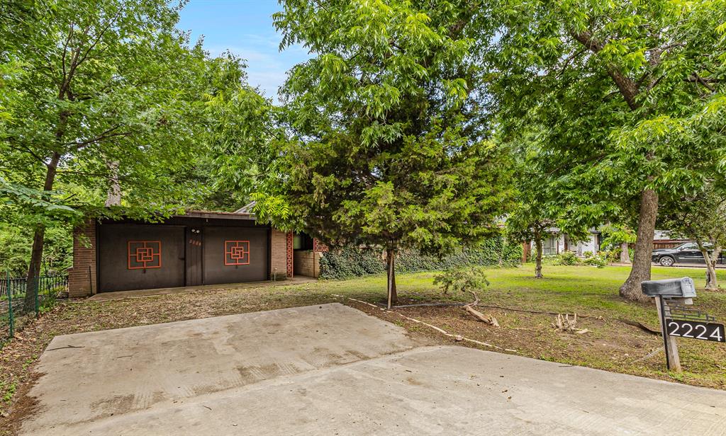Rare opportunity to own an authentic 3-bedroom, 2-bath mid-century modern home nestled on a picturesque creek lot. This architectural gem features timeless design, clean lines, and expansive windows that bring in abundant natural light while showcasing tranquil creek views. Backing directly to the creek, the property offers a peaceful, private setting surrounded by mature trees. The original kitchen and baths remain intact, providing vintage charm and a unique opportunity for preservation, restoration, or thoughtful modernization. Whether you’re a mid-century enthusiast or looking for a one-of-a-kind property with incredible potential, this home offers the perfect blend of architectural character and natural beauty.