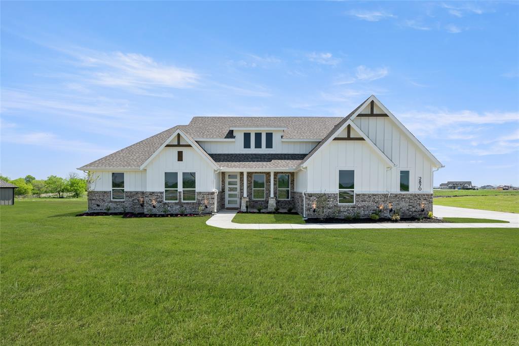 MLS# 20879178 - Built by Impression Homes - Ready Now! ~ West facing home located in the sought-after Carrera Ranch subdivision, just minutes from downtown Waxahachie, dining, and shopping, this 2,442 sqft. open-concept design is great for entertaining! Situated on 1 acre lots on a quiet street, this home features 4 bedrooms, 3 baths, a mudroom, Large Covered Patio and a walk-in laundry room.