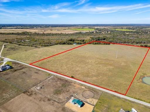 Discover the epitome of Texas tranquility with this stunning 26-acre tract of land, perfectly situated between Alvarado and Cleburne. This piece of paradise boasts breathtaking views and multiple building sites. With an all-weather county road this land is not only beautiful but practical. If you're looking to build your dream home or simply get away form urban sprawl, this property offers endless possibilities. Embrace the peaceful rural life while still being conveniently close to town. This is an opportunity you don’t want to miss! Come home today!