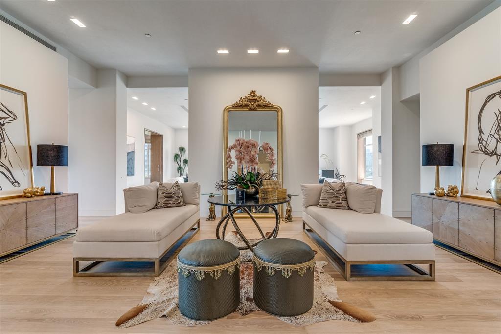Rare opportunity to live at the Mansion Residence, one of the most exclusive properties in Dallas. Located on a beautiful lush greenbelt portion of Turtle Creek, the downtown views from this 7th floor home are unsurpassed. Both sky and creek vistas are delivered from the large windows which allows for significant light and sun to stream into this warm and inviting home.  A stunning art gallery entrance greets. Separate Study with cerused oak bookshelves sits across from a large open formal living room. A chef's kitchen with Danby marble countertops and breakfast room with a convenient butler pass through to the formal dining.  Oversized private Primary with split and separate ensuite baths and closets. Terrazzo and oak flooring, huge storage and window coverings throughout.