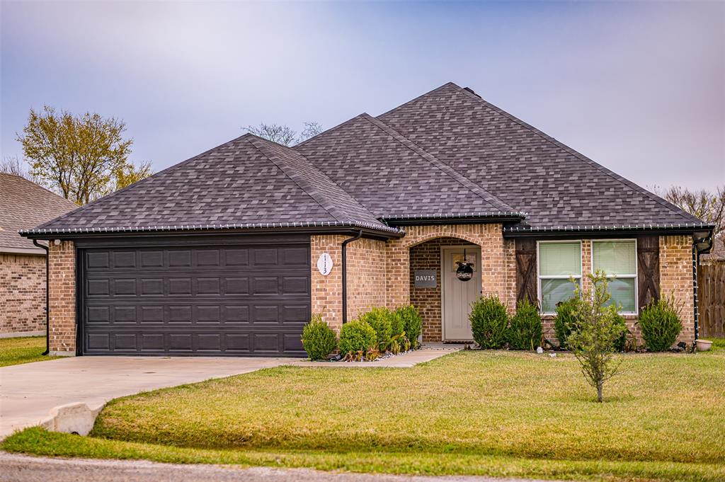 Step inside this Palmer, TX home to find wonderful tile floors that flow seamlessly throughout the entryway, family room, kitchen, and dining room area. The family room boasts large windows for natural light, creating a perfect gathering spot for friends and family. The kitchen is open with tons of storage, featuring stainless steel appliances, a stunning tile backsplash, and gorgeous real wood cabinets. Retreat to the primary suite for space and relaxation. The master bathroom is impressive with a walk in closet and granite countertops. Two additional bedrooms are perfect for guests. Each bedroom has roomy closets and easy access to a full bathroom. Plus, there's a full-sized utility room and direct access to the two-car garage for added convenience!  Plenty of yard space to entertain.  Make this yours today, schedule your private tour.  Area qualifies for USDA and possible down payment assistance to those who qualify, contact us today for details! Bring your best offer Today.