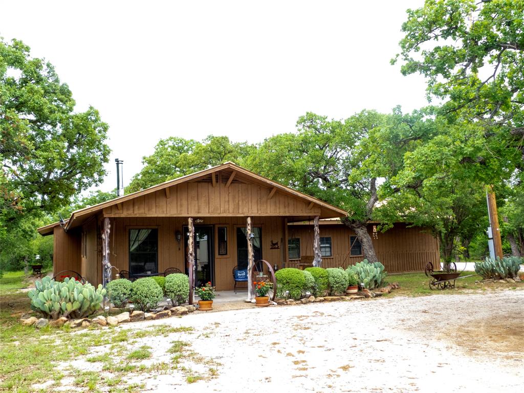 41.7 ACRES BROWN CO. ELEVATION, HOME AND ALL WOODED!!! 
 Let your distractions dissolve when you drive onto this 41 acres located in northern Brown Co. Just 15 miles from Brownwood this tract is highly desirable hunters paradise, proven with its trophy low fence whitetail, the property has produced two big buck contest winners. You will find an abundance of native game including whitetail, turkey, and hogs. Nestled in the rolling terrain you find places of big elevations and rock outcroppings, along with 2 stock tanks. Tucked in the heart of the property is a cozy 2 bedroom 1 bath home. The large living space provides for a relaxing evening by the wood burning stove or a drink on the porch as the tranquil evening sets. The bedrooms have ample space and ease of access off the main living area. There is an attached garage and two outbuildings for shops or storage if one desired. Properties like these are very rare to have the seclusion, elevation, and tree cover as good as this one has. Come take a look and see this amazing property.