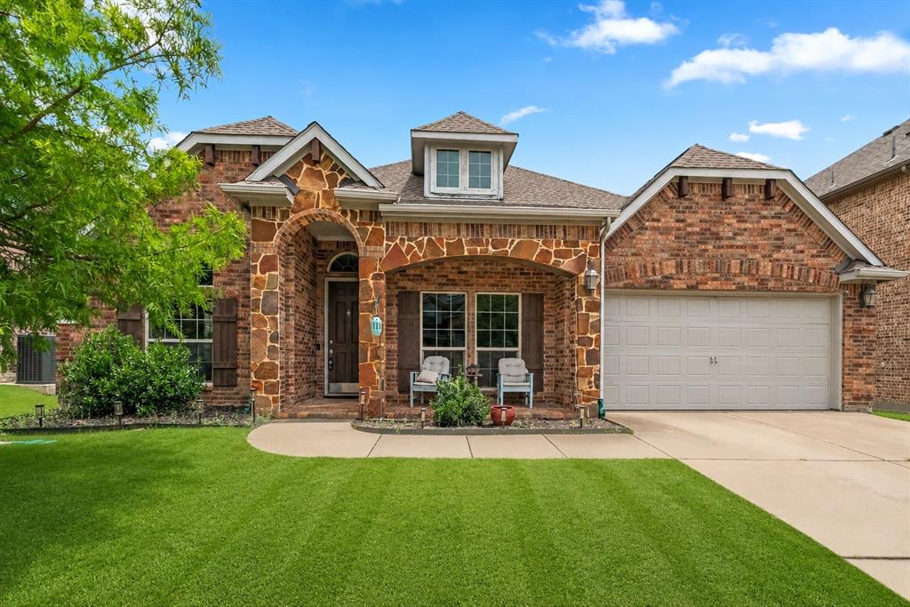 *NORTHWEST-ISD!!*1.5 STORY FLOORPLN!!*4 BEDS PLUS BONUS ROOM!!*
This home offers a thoughtfully designed 1.5-story floorplan with all bedrooms located downstairs and a spacious upstairs flex room. A covered front porch welcomes you inside, where abundant windows and natural light create a bright and inviting atmosphere throughout the home.
The heart of the homem is the kitchen, showcasing dark granite countertops, natural slate tile flooring, gas cooktop and oven, oversized center island, butler’s pantry, and a large walk-in pantry designed for both everyday functionality and entertaining. Open to the kitchen, the spacious living area features a stunning floor-to-ceiling stone fireplace with wood-burning capabilities, gas starter, raised hearth, and wood mantel that serves as a warm focal point.
A dedicated office or 4th bedrooms with rich wood flooring and decorative accent wall provides versatility, while the formal dining room offers additional space for gatherings and special occasions. The oversized primary suite includes a bay window sitting area with abundant natural light, while the ensuite bath features dual sinks, separate vanities, soaking tub, separate shower, and an oversized walk-in closet. Additional downstairs bedrooms provide flexibility for guests, hobbies, or daily living needs.
Upstairs, the spacious bonus room with vaulted ceilings and large windows is ideal for a game room, media room, or second living area. The backyard offers a large patio, expansive grassy space, and a fully fenced setting perfect for relaxing, entertaining, pets, and play. Situated in a sought-after community featuring playgrounds, a resort-style pool, and scenic walking and jogging trails, and is zoned to highly acclaimed Northwest ISD. Just minutes from the Alliance Town Center and Prisidio Shopping, dining, entertainment, and major highways.