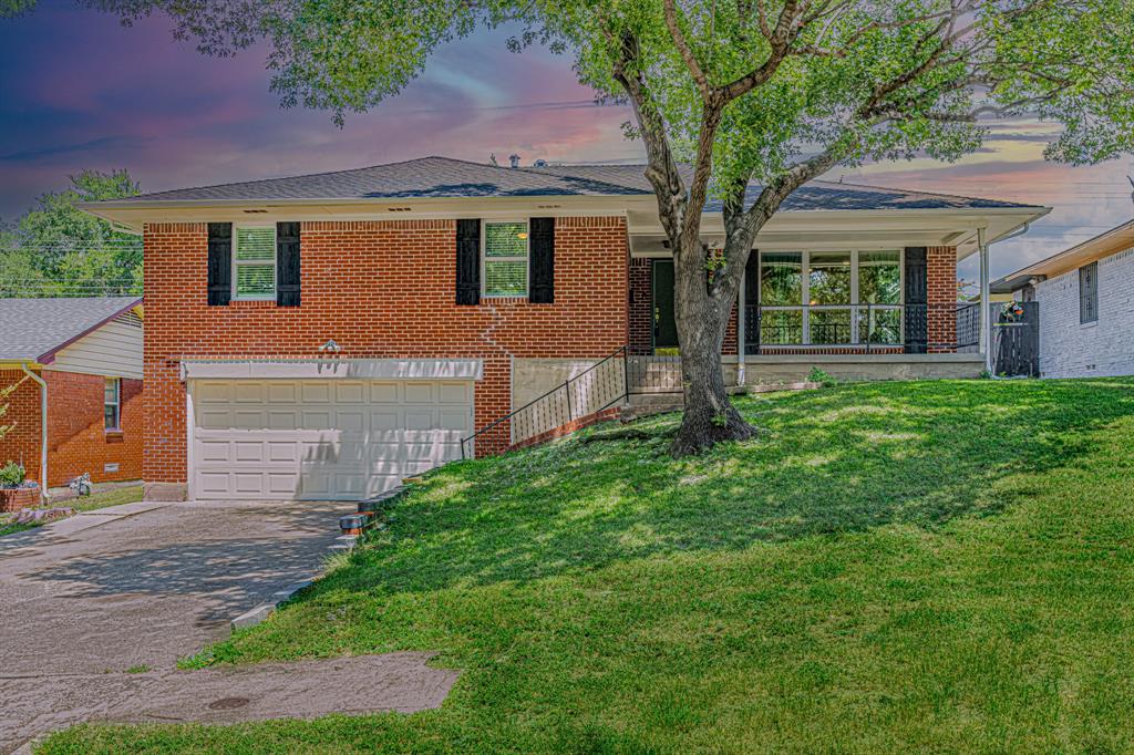 Situated in the established neighborhood of Urbandale, this charming split-level home is ready for its next owner. Featuring three bedrooms, two and a half bathrooms plus a bonus room, this home seamlessly blends original charm and modern updates.  Highlights include original flooring, an updated kitchen and SS appliances, updated bathrooms with penny tile flooring, Oct 2023 HVAC, Jan 2025 Roof and Gutters, and newer windows. Three bedrooms and 2 baths are on the top level while the bonus room is on the ground floor. Turn the bonus room into a workout space, gaming room, private workspace, or use it as an additional bedroom, The bonus room has a private courtyard, half bathroom, and utility closet with washer and dryer hookups plus built in cabinetry. Enjoy the sunrises on the back patio and watch the sunsets on the front porch stoop as you unwind your day. Newer Privacy fence with back gate access provides the opportunity to add a shed, workshop, or additional parking. 15 minutes to Downtown Dallas, the Dallas Farmers Market, Dallas Fair Grounds, Deep Ellum, Lower Greenville and more. Special Financing Available