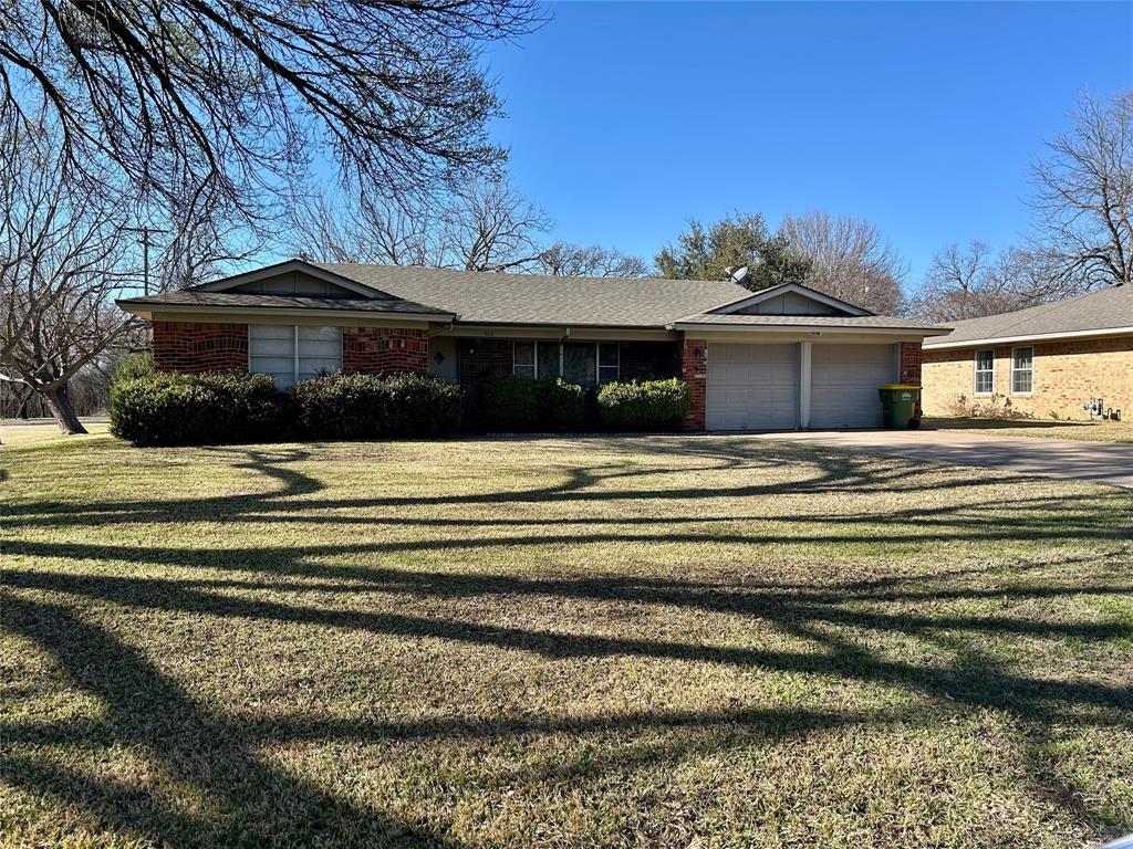 Welcome home to this charming 2-bedroom, 2-bath brick home nestled on a desirable corner lot in a quiet neighborhood in downtown Hubbard, TX. This well-maintained property offers the perfect blend of small-town living and everyday convenience.

Inside, you’ll find a functional layout with comfortable living spaces and spacious bedrooms. Step outside to enjoy a fenced backyard ideal for pets, play, or entertaining. The covered back patio creates the perfect spot for morning coffee or relaxing evenings. A two-car garage provides ample parking and storage.

Located in the heart of Hubbard, you’ll appreciate the peaceful atmosphere while still being centrally positioned between Dallas-Fort Worth, Austin, and Houston, with Waco just a short drive away. Enjoy small-town charm with easy access to major cities for work, shopping, dining, and entertainment.

This corner-lot gem offers comfort, convenience, and location all in one. Schedule your showing today.

This home is currently leased through August but is still available for showings with prior notice—great opportunity for investors or buyers planning ahead!

Selling agent is related to seller.