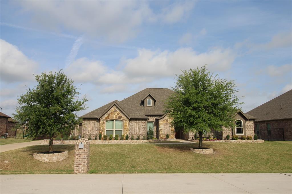 Back on Market Again and nothing to do with house! Buyers backed out because they decided the drive was too far from their work.  This is a great house, pool service maintained, New Roof, New windows, New HVAC, New landscaping, New sprinkler system, Have your agent send you the list of enhancement. Gorgeous 1 story Dream Home on oversized 100x150 lot with a salt water pool, covered patio and an outdoor living space.  No MUD and No PID! This open floor plan has a large eat in kitchen and island, granite counter tops, separate prep sink and SS gas appliances.  Custom cabinets galore with planning desk just off the breakfast area and a walk in pantry. Work from home in your spacious study with French doors, and entertain in your huge great room with stone fireplace.  Wood style tile floors for easy cleaning and perfect for pets.  Laundry room has a sink and cabinets for storage. 3.5 Car garage spaces have epoxy floors with passage door to back yard with iron fencing and wonderful landscaping. Storage-work cabinets & ceiling storage racks in garage. Exterior up-lighting on front of house with holiday light package. And so much more.