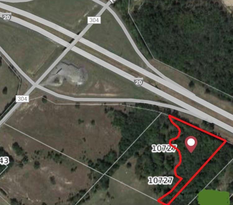 6 plus acres in desirable location close to I-20 Frontage Road and Tanger Outlet Mall in Terrell.  Close to Buc-ee's, shopping centers, Terrell Municipal Airport and Southwestern Christian College.  Buyer to check easements and measurements.  Front of property adjacent to access road.  No survey available and at the expense of the buyer.  Proposed city access road survey in photos. Great opportunity in fast growing Terrell!  PROPERTY FALLS WITHIN THE FEMA 100 YEAR FLOOD ZONE.  Seller will consider owner financing.