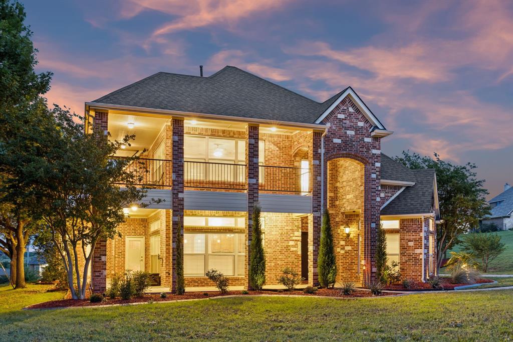 Buyers searching for homes in Fort Worth with acreage and lakeside proximity will find an exceptional opportunity at 3721 S Lighthouse Hill Ln. Perched on an elevated, large 1-acre lot within the gated Harbour View Estates community near Eagle Mountain Lake, this 3,474-square-foot custom-built residence serves as a premium new construction alternative featuring extensive completed upgrades. The versatile 2-story layout features multiple living areas on both levels, integrating a dedicated office-study that makes it effortless to work from home. In the well-appointed kitchen, double ovens, custom butcher block accents, generous cabinetry, and a light-filled breakfast nook overlook the scenic surrounding landscape. The main-level living areas flow logically into a formal dining space, centered around expansive windows and architectural details configured for comfortable entertaining. Positioned on the main floor for maximum privacy, the primary suite features a newly installed custom closet system and a spa-like bath layout. The secondary spaces include 3 additional bedrooms, 1 full bath, 2 half baths, and a massive upstairs bonus room that easily adapts into a media room or gym. Outside, dual-level balconies and a wraparound porch lead down to a backyard oasis complete with a sparkling pool, a spa with new mechanical equipment replaced in 2023 and 2024, an outdoor kitchenette, and dedicated parking for recreational vehicles or watercraft. This move-in ready home offers a better location access advantage over newer developments, providing convenient access to Business US-287, I-820, and local employment hubs, while remaining within the sought-after Eagle Mountain-Saginaw ISD boundaries.