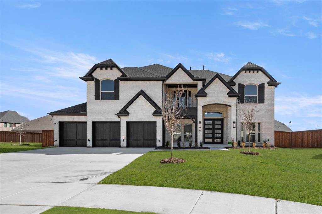 MLS# 21122368 - Built by First Texas Homes - Ready Now! ~ This stunning 5-bedroom, 4-bath home offers 4,250 sq ft of luxurious living space and a 3-car garage. Enjoy a welcoming front balcony perfect for morning coffee or relaxing with a book. The impressive family room features floor-to-ceiling windows, a 19-foot flat ceiling, and a striking linear fireplace. Entertain with ease in the open California kitchen, complete with quartz countertops, custom cabinetry, and professional-grade appliances. The primary suite includes a spa-like bath with a free-standing tub. A spacious media room with a dry bar and surround sound prewiring is ideal for movie nights. Modern finishes throughout create a perfect blend of style and comfort. Schedule your tour today!