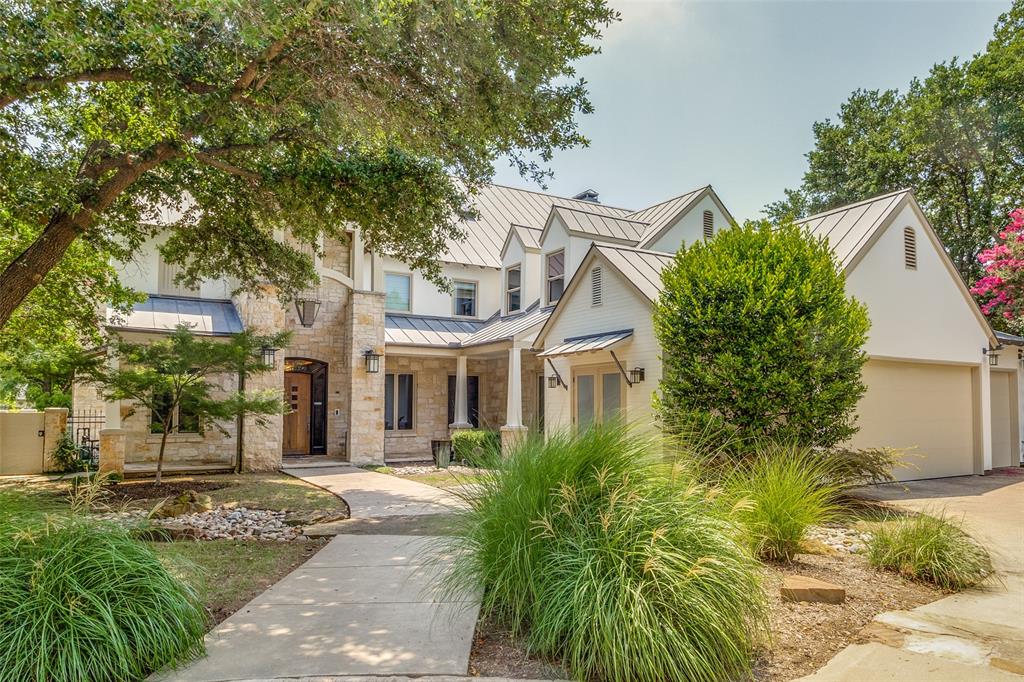 Extraordinary masterpiece located in sought-after Preston Hollow with lake views from every south facing windows! The home boasts elegance with high ceilings, natural light and it is perfect for entertaining and family living. Gourmet kitchen is complete with stainless steel appliances, double ovens, commercial gas range, and so much more! Enormous 1,000 square feet primary suite with exercise room, study, sitting area and a spa like primary bath with a fireplace and sauna. Backyard oasis includes lush landscaping, enclosed turf yard, a pool with water features, an outdoor living area with a fireplace, and an outdoor kitchen. This residence offers the perfect blend of opulence, comfort, and natural beauty, creating an exceptional living experience that is simply unparalleled.