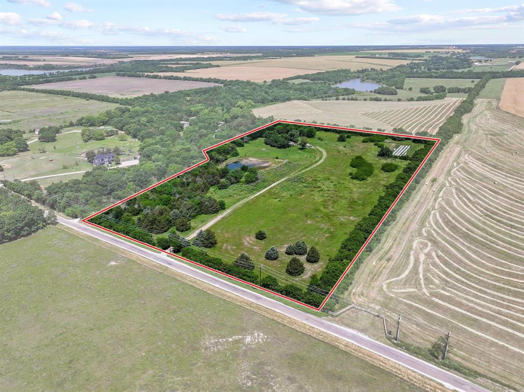 Welcome to your next big opportunity — nearly fourteen acres of untapped potential just waiting for a visionary to bring it to life. Nestled outside city limits in the thriving North Texas corridor, this remarkable parcel offers the kind of freedom and flexibility that developers and investors dream about.

Spanning an impressive 13.76 acres, this property sits in one of the most rapidly evolving areas in the region. New infrastructure and power lines have already made their way through the surrounding landscape, signaling the wave of growth that is sweeping through this community. A new power plant nearby further underscores the momentum and demand building in this pocket of opportunity.

One of the most attractive features of this land is that utilities are already in place through Grayson-Collin Electric Cooperative and Dorchester Water eliminating a significant hurdle in the development process. Whether you envision a residential subdivision, a commercial venture, or a mixed-use project, the groundwork has literally been laid for you.

An existing structure currently sits on the property, though it is designated as a tear-down and no interior showings are permitted. Think of it as a blank canvas with a temporary placeholder — the real value lies beneath your feet and stretches across every acre of this prime land.

With the North Texas region experiencing explosive growth, properties like this rarely linger on the market. Schedule your visit today and start turning raw land into your greatest investment yet.

For Further Information - CALL JENNA TOLAND AT NINE-ZERO-THREE-TWO-TWO-SEVEN-SIX-ZERO-THREE-FOUR