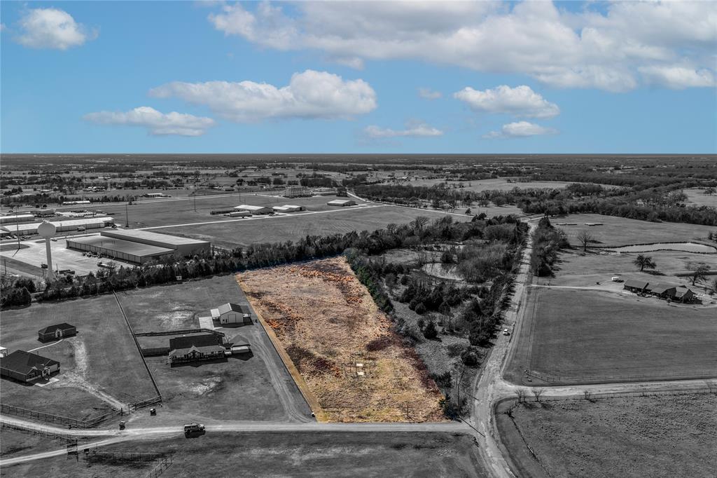 Set within the peaceful J3 Ranch community, this expansive 5.3-acre tract offers the perfect canvas to bring your vision to life. The land is cleared, level, and ready for development, making it ideal for a custom home, weekend retreat, or long-term investment. Electricity and water are conveniently available at the street, simplifying the building process, while the private road provides added privacy and a quiet, country atmosphere. Located in Wills Point ISD and free from known restrictions, this property delivers the freedom and flexibility today’s buyers are seeking—all while maintaining easy access via GPS and nearby conveniences. A rare opportunity to own usable acreage in Van Zandt County with endless potential.
