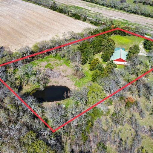 Beautiful home in Whitewright, Tx that sits on 3.5 acres with a pond and the carport has a small building attached to it. This property has a great open concept for entertaining guest. The kitchen has lots of cabinets and great natural lighting. 2,640 Sqft home with a nice floor plan.  This property is in a great location and out of city limits. The back porch over looks the pond and has a beautiful view. This property is a must see and you don't want to miss this one!



Buyers and buyers agent verify all information