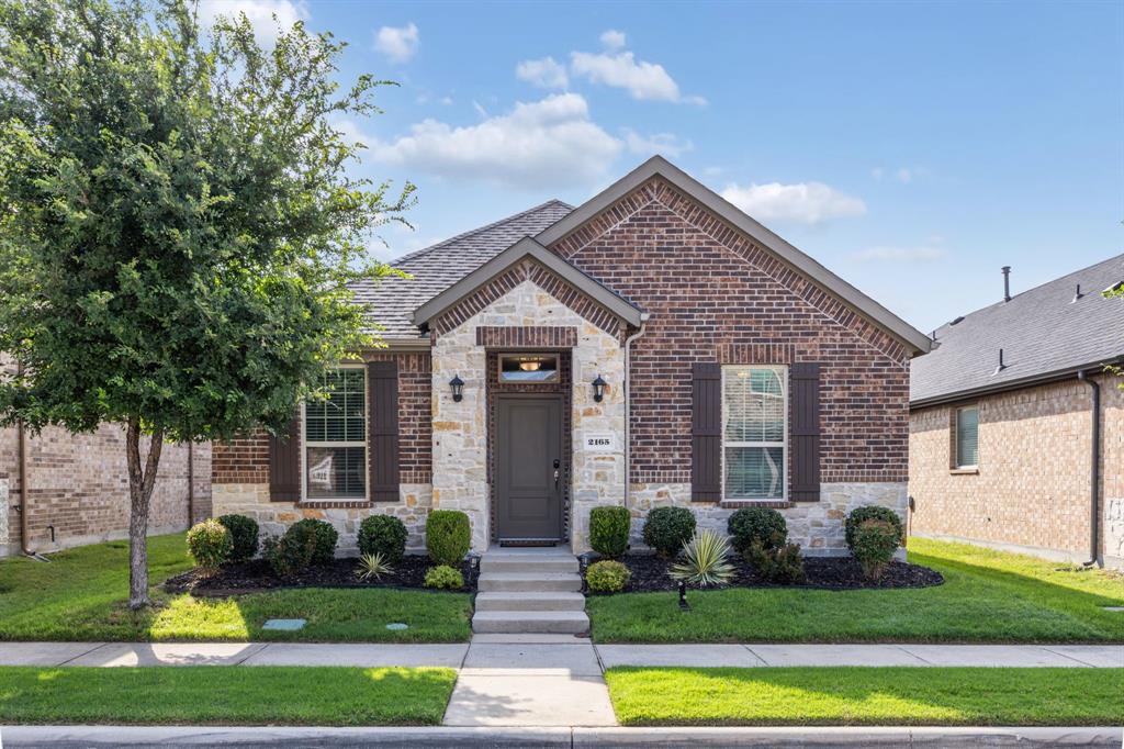 Step into style and comfort in this beautifully maintained single-story home featuring an open-concept layout and modern finishes throughout. The spacious living and dining areas flow seamlessly into a stunning chef’s kitchen complete with granite countertops, dark wood cabinetry, stainless steel appliances, gas range, oversized countertops with seating, designer backsplash, and upgraded fixtures. Luxury vinyl plank flooring extends through the main living spaces, creating a warm and contemporary feel.
The private primary suite offers a relaxing retreat with plush carpeting, dual vanities, a soaking tub, separate glass-enclosed shower, and generous walk-in closet. Secondary bedrooms are well-sized with ample natural light and access to a beautifully finished guest bath. A spacious laundry room with backyard access adds convenience and functionality.
Enjoy outdoor living in the fully fenced backyard with covered patio, lush landscaping, and plenty of space to relax or entertain. Community amenities include a resort-style pool, volleyball, clubhouse, fitness center, walking trails, and scenic green spaces.
This move-in ready home combines modern design, thoughtful layout, and exceptional community amenities in one incredible package.