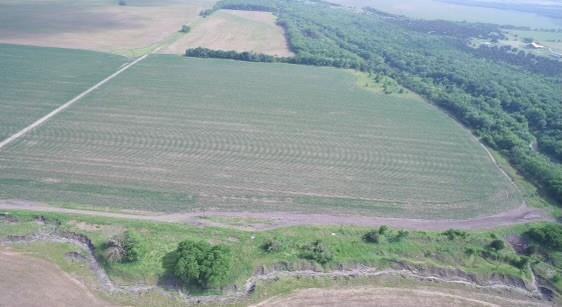 Prime opportunity to own approximately 35.97 acres of unrestricted land in the rapidly expanding growth corridor of Hunt County. Located on County Road 2720 in Caddo Mills, this property offers an exceptional combination of privacy, accessibility, and long-term investment potential. The land features level to gently rolling terrain, making it ideal for a variety of uses including residential development, private estate, ranching, commercial use, or buy-and-hold investment.

Property includes valuable infrastructure improvements, including an 8-inch water pipe servicing the area, adding significant future development potential and utility accessibility. With ample county road frontage and easy access to major thoroughfares including Highway 66 and Interstate 30, this location provides convenient connectivity to Greenville, Royse City, and the Dallas-Fort Worth Metroplex.

Situated outside city limits, the property benefits from no HOA restrictions and no known MUD or PID assessments, helping keep holding costs low. Agricultural exemption is currently in place, contributing to significantly reduced property taxes. Utilities availability to be verified by buyer.

Seller financing available with only $25,000 down, based on a 30-year amortization at 6.5% interest, with balloon payment due in 36 months, creating a rare opportunity for investors, developers, or owner-users seeking flexible acquisition terms.

This area is experiencing continued residential and land development growth, making this a strategic acquisition for builders, developers, or investors looking to capitalize on the eastward expansion of DFW.
