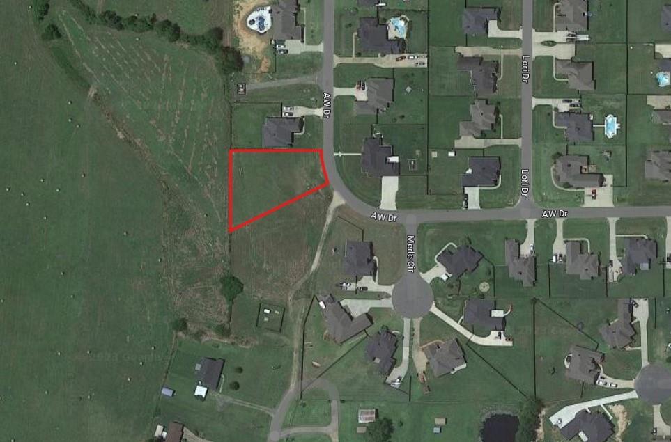 Nestled in the coveted Cathey Acres subdivision in Stonewall, this .52-acre lot is a blank canvas awaiting the masterpiece of your dream home. Surrounded by charm of a well-established community, this sought-after location offers the perfect blend of privacy and community living. With a generous plot size, you have ample space to design and create the home you've always envisioned. Seize the opportunity to build your sanctuary in this idyllic setting.