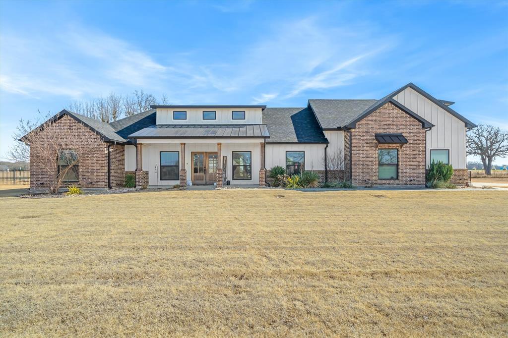 This STUNNING CUSTOM BUILT HOME truly checks every box—space, style, and an ideal layout for entertaining! Thoughtfully positioned on a 2.3 acre OVERSIZED LOT, one of the largest in this section of the neighborhood, this 3 bedroom, 3.5 bathroom property offers privacy, flexibility, and room to grow, both inside and out! The OPEN FLOOR PLAN is designed for connection and comfort, anchored by a show-stopping custom wood ceiling in the main living area that adds warmth and architectural character you've been dreaming of! The spacious kitchen features a large center island ideal for gatherings, meal prep, or casual dining, and flows seamlessly into the living and dining spaces making it perfect for hosting everything from holidays to everyday get-togethers! The primary suite offers a peaceful retreat with a well-appointed bathroom featuring a DOUBLE VANITY, ample storage, and a functional layout designed for ease and relaxation. Guest bedrooms are thoughtfully arranged while a separate half bath provides convenience for visitors without disrupting bedrooms! A versatile bonus room provides endless options and can easily serve as a MOTHER IN LAW SUITE, MEDIA ROOM, OR PRIVATE OFFICE offering flexibility to meet changing needs and lifestyles. Step outside to the HUGE COVERED BACK PORCH, an entertainer’s dream and the perfect extension of the living space! Whether hosting large gatherings, enjoying quiet mornings, or taking in evening sunsets, the expansive backyard and acreage provide a rare sense of space and tranquility. The oversized lot offers endless possibilities—room for a pool, shop, garden, or simply open space to enjoy. Schedule your private tour TODAY!