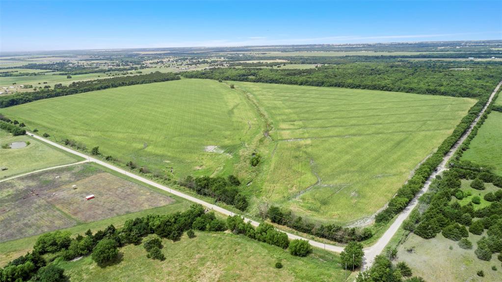 Seize a premier 105-acre investment opportunity just beyond Greenville’s city limits, crafted for visionary developers, savvy investors, or those dreaming of a bespoke estate. This expansive acreage boasts extensive dual-sided road frontage, unlocking unrivaled accessibility and high-profit subdivision potential for residential, commercial, or mixed-use projects. Nestled among scenic rolling hills and fertile farmland, this development land blends serene rural charm with effortless access to Highway 69, Highway 380, and Greenville’s vibrant downtown. Free from floodplain concerns, this large parcel guarantees secure, long-term value for your real estate venture. Don’t miss this rare Greenville real estate gem—schedule your tour today to transform this prime development opportunity into your legacy!