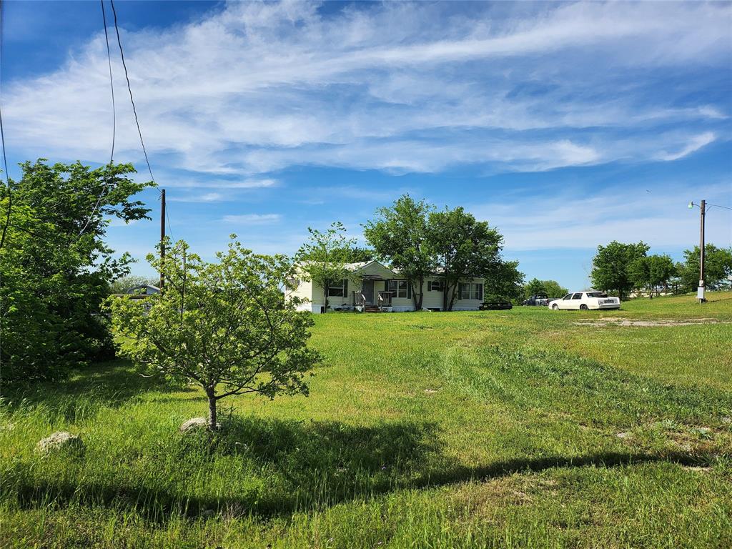 Home on 2.5 acres with great view. Value in land with improvements. Home will need repairs and will NOT finance FHA,VA OR USDA. Sold as is condition seller will not make any repairs. 
Buyer must be with agent to tour home.All info to be verified by buyer or buyers agent.