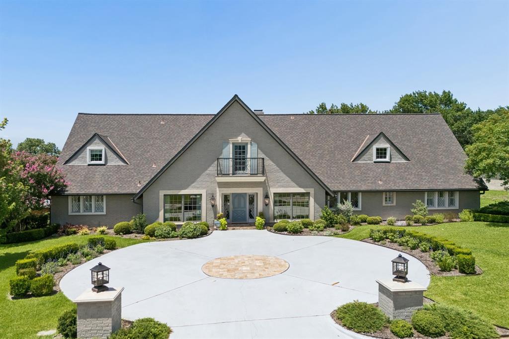 Welcome to an extraordinary residence in prestigious Northwood Hills Estates, where timeless sophistication meets refined modern luxury. Meticulously reimagined from the grand motor court to the resort-style backyard, this exceptional home offers 6 bedrooms, 5.1 baths, and 4,228 square feet of thoughtfully curated living space designed for elevated living. At the heart of the home, the chef’s kitchen showcases exquisite quartz countertops, an expansive island, double ovens, a warming drawer, and a microwave, all complemented by a sunlit breakfast area framed by a stunning picture window overlooking the lush grounds. The serene primary suite is a true sanctuary, featuring a spa-inspired bath and an adjoining study or sitting room with elegant French doors that open to the patio. The majority of the home’s luxurious living spaces are conveniently located on the first floor, while the upper level offers a spacious game room, full bath, and a versatile hobby room that can easily serve as a sixth bedroom. Designed for unparalleled outdoor living, the backyard is a private oasis ideal for both grand entertaining and tranquil relaxation. A beautifully crafted flagstone pergola with dual ceiling fans, a charming swing, and ambient party lighting sets the stage for unforgettable gatherings. The sparkling 40-foot diving pool, artificial turf, lush landscaping, and raised stacked-stone flower beds complete this resort-inspired retreat. This impeccably updated Northwood Hills Estates residence offers a rare blend of elegance, comfort, and sophistication-truly a turnkey masterpiece ready to be enjoyed.
