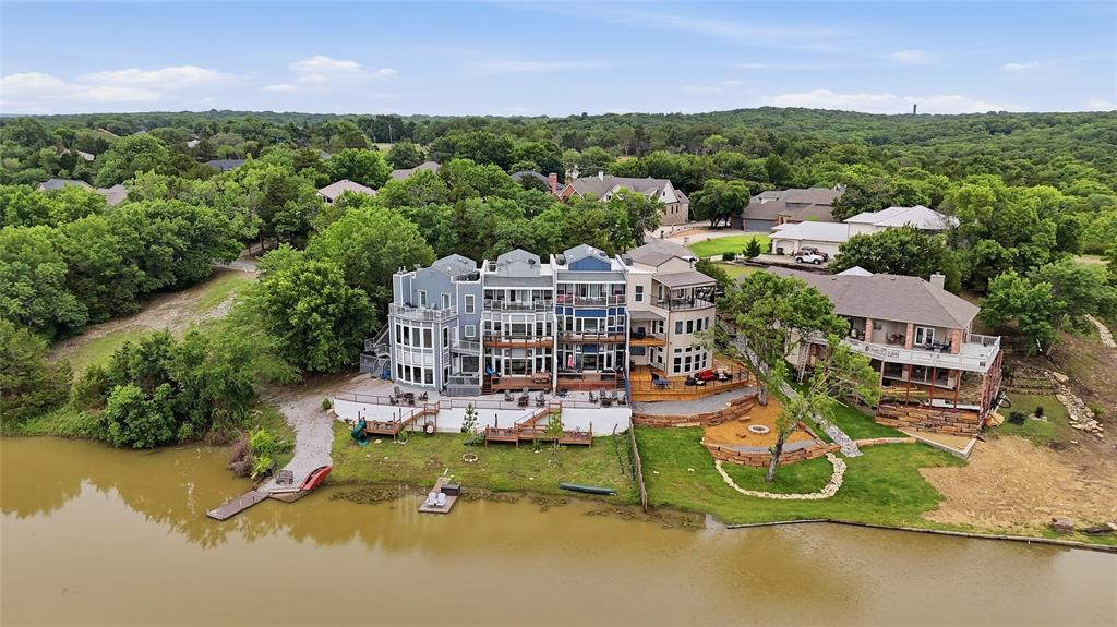 Beautiful three story townhouse offering 3 spacious bedrooms, 3 full baths, and a convenient half bath, perfectly designed for relaxing lake living. Enjoy multiple oversized decks with stunning views overlooking your own private lake, creating the perfect setting for morning coffee, entertaining guests, or peaceful evenings watching the sunset.
This home features an oversized two car garage, generous living spaces, and a layout ideal for both full time living and weekend getaways. Nestled in a quiet and peaceful setting near beautiful Lake Texoma and close to Tanglewood Resort, you’ll enjoy easy access to boating, golfing, dining, and recreation while still feeling tucked away in your own private retreat.
Whether you’re searching for a serene escape or a place to entertain family and friends, this waterfront townhouse delivers comfort, views, and an unbeatable location. Condo, townhouse totally remodeled.