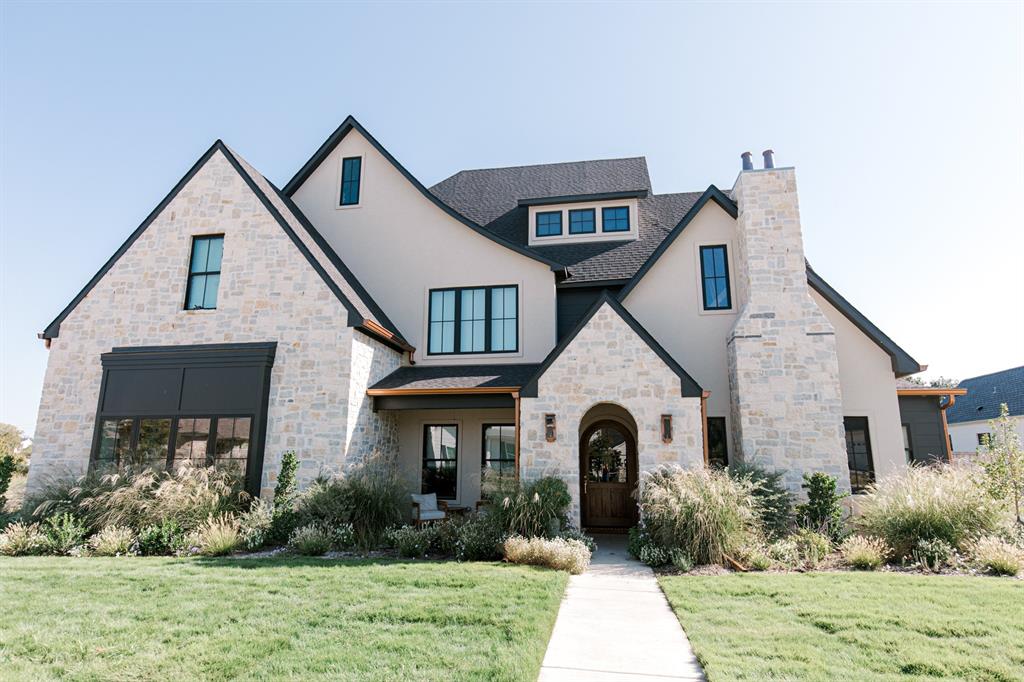 A thoughtfully designed custom home built by Whyte Oak Homes that blends timeless architecture with modern functionality, creating a space built for connection, comfort, and everyday living.
Nestled in the heart of Badger Ranch, this Modern Tudor-style residence was crafted to serve a growing, active family while showcasing the design-build capabilities of Whyte Oak Homes. With 5 bedrooms and 4.5 baths, the home balances spaciousness with purpose, offering both private retreats and inviting gathering spaces.
From the moment you arrive, the home makes a statement. A custom arched entry door sets the tone for the architectural character carried throughout, where soft curves, rich materials, and curated finishes create a warm, elevated aesthetic. Inside, natural light and intentional sightlines enhance the flow between spaces, making the home feel both open and grounded.
The heart of the home is designed for connection, anchored by a chef’s kitchen with double islands, premium appliances, and seamless access to indoor and outdoor living. A 12-foot pocketing slider opens to a vaulted back patio complete with an outdoor kitchen, extending the living space and making it ideal for entertaining or everyday family life.
The primary suite is a private sanctuary, featuring vaulted ceilings, a fireplace, and a spa-inspired bathroom with a soaking tub and oversized shower. A custom-designed closet connects directly to the laundry room, blending luxury with practical design.
Throughout the home, millwork, 4 fireplaces, and carefully selected materials reflect a luxury craftsmanship and detail. Additional features include a butler’s pantry, media room with surround sound, and thoughtfully designed secondary spaces such as a study or library.
Every detail reflects a balance of beauty, durability, and function, aligning with Whyte Oak Homes philosophy of building homes that are not only visually compelling but designed to stand the test of time.
Seller is licensed realtor