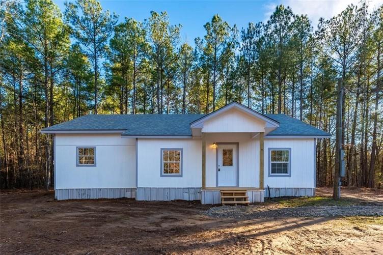 Are you looking for a blend of modern living and peaceful countryside? Get into this beautiful three-bedroom, two-bathroom home, which sits on over 7 acres of woods! Step into the open-layout kitchen and living room to feel the warm and inviting space for cooking and entertaining. Enjoy the quiet, country living with quick access all the amenities of the city of Mount Pleasant, Texas. Two additional acres adjoining the property are also for sale.