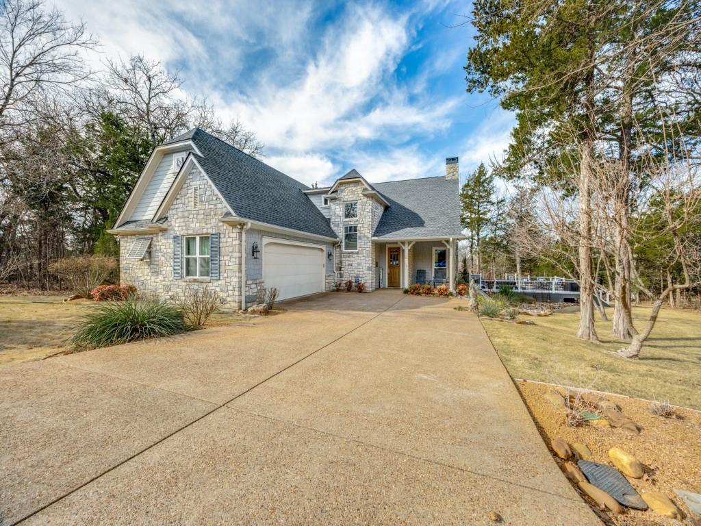 Seller is offering a 2-1 temporary buydown: Seller escrows up to $14K with lender...For example, if interest rate is 6.5% the first year payment will be based off 4.5% rate, the second year payment will be based off 5.5% rate and third year and beyond is based off 6.5% rate. If buyer refinances before the two-year temporary buydown period is over, any unused portion of the buydown will be credited toward the buyer's principle so none of the seller incentive is wasted. Or, the buyer can simply use $14K toward closing costs..... Beautiful home in the sought-after golf course and lake community of Rock Creek Resort. This thoughtfully designed residence offers 4 spacious bedrooms, with one ideal as a home office or bunk room, and 4 full baths for comfort and convenience. The open floor plan creates a seamless flow between living, dining, and kitchen spaces, perfect for entertaining or relaxed everyday living. Step outside to an enclosed back patio (18.6x13.5) featuring a built-in kitchen and living area, extending your living space year-round. Additional Trex decking surrounds the swim spa, creating an outdoor retreat ideal for relaxing after a day on the lake or golf course. All flooring replaced December 2024 and roof replaced in June 2025.  Enjoy the unmatched lifestyle of Rock Creek Resort with wonderful lake living, scenic surroundings, and resort-style amenities—all in a home designed for making lasting memories.