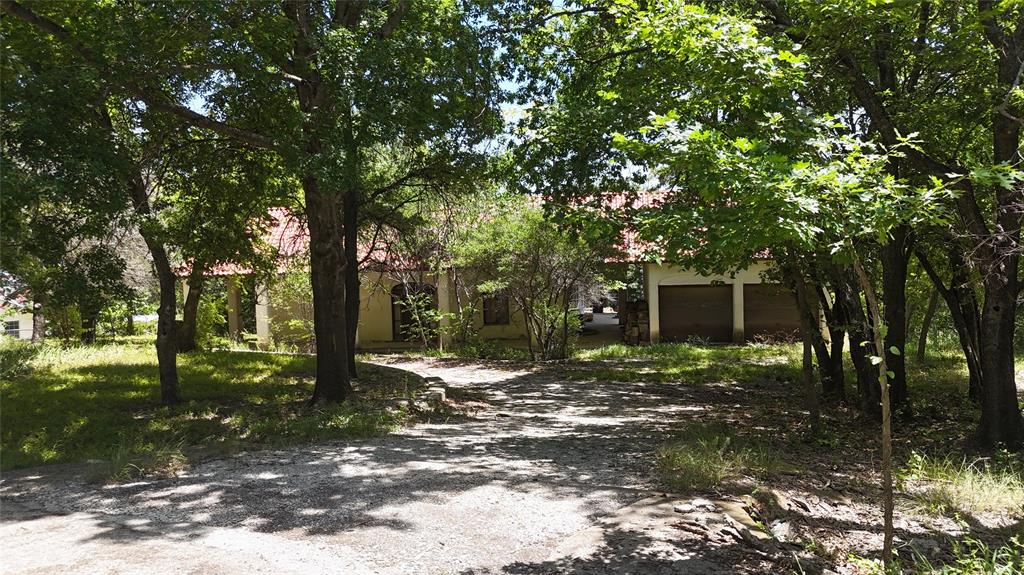 No showings until July 11th open showing from 10am to 1pm. Rare investment opportunity in the highly sought-after Aledo ISD. Situated on over 2 acres of land, this property offers significant potential for a complete transformation or a blank canvas for a new custom build. This is an exceptional chance to secure a large parcel in a prime location known for its excellent schools, scenic landscapes, and proximity to Fort Worth.

The property is being sold strictly as-is, where-is. Due to the extensive nature of the required renovations or potential demolition, the seller will make no repairs. All due diligence must be completed by the buyer prior to submitting an offer. This property is suited for cash or conventional financing only.

With its combination of generous acreage and desirable school district, this listing represents a strategic project for investors or buyers looking to create a custom estate in a top-rated community. Buyers are encouraged to conduct all necessary investigations regarding local regulations, permits, and zoning to realize the full vision for this expansive lot. Do not miss this chance to acquire a unique asset in one of the area's most stable and popular districts. All information provided is deemed reliable but should be independently verified by the buyer.